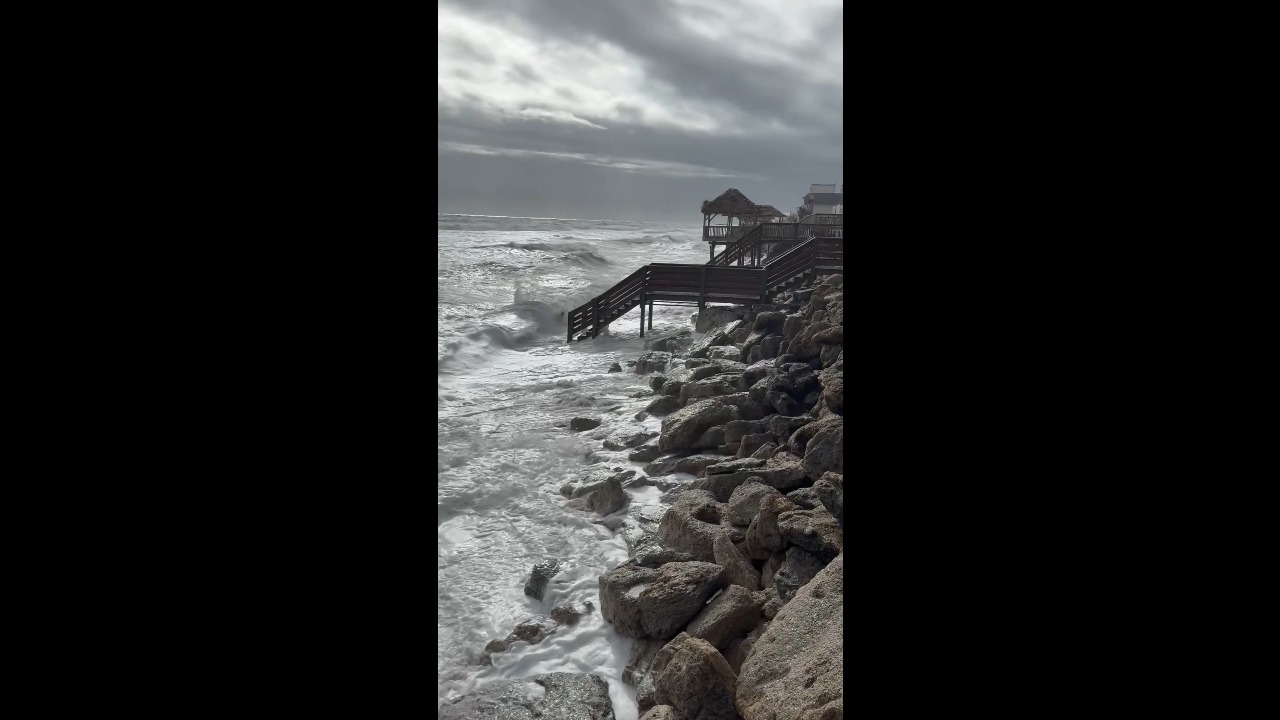 King Tides and 10-foot surf damage beach stairs in New Smyrna Beach, Florida, USA