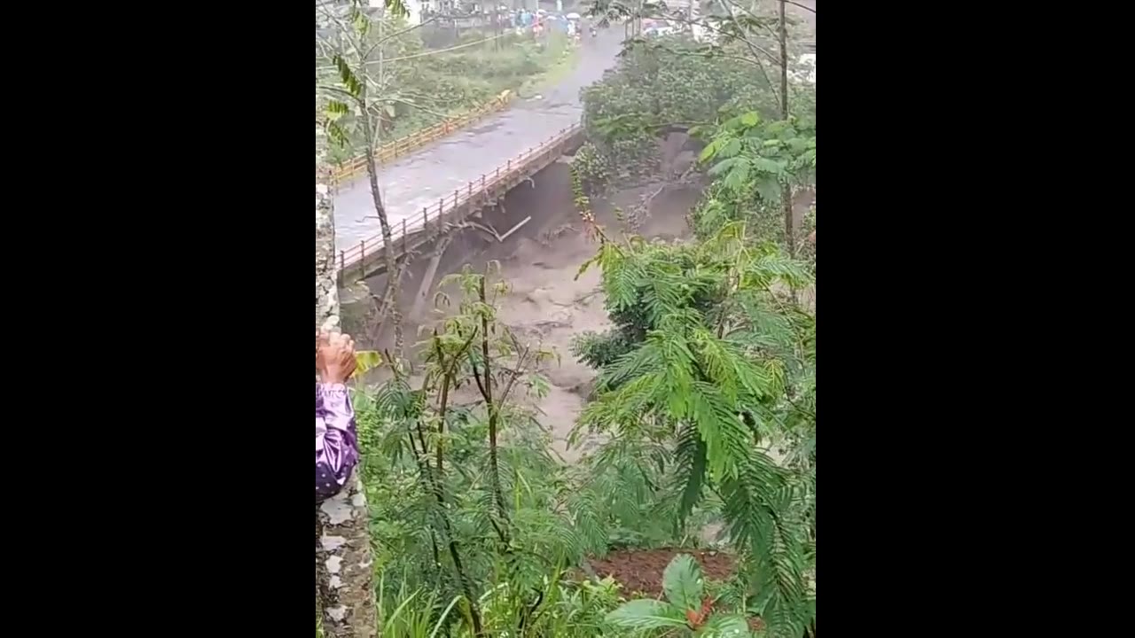 Devastating flash floods in Lumajang: bridge to Malang washed away