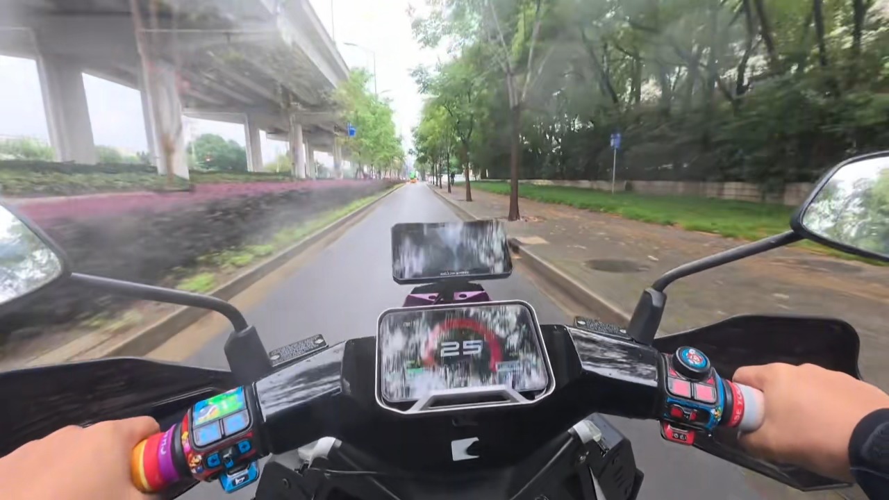 Motorcyclist crashes into car making a sudden right turn in Shanghai, China