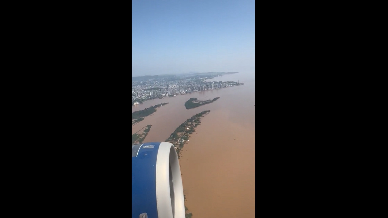 Worst flooding in 80 years: aerial view of Guaíba River engulfing Porto Alegre, Brazil