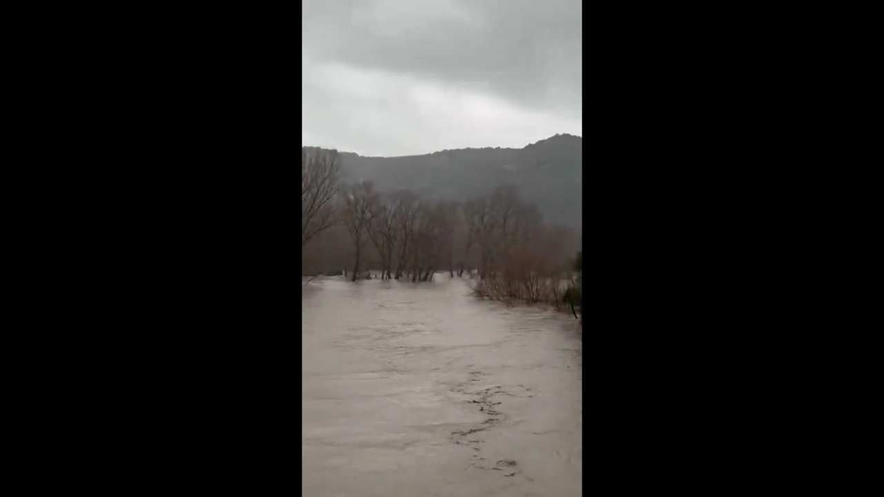 Hérault River bursts banks, flooding fields and roads in Brissac, France