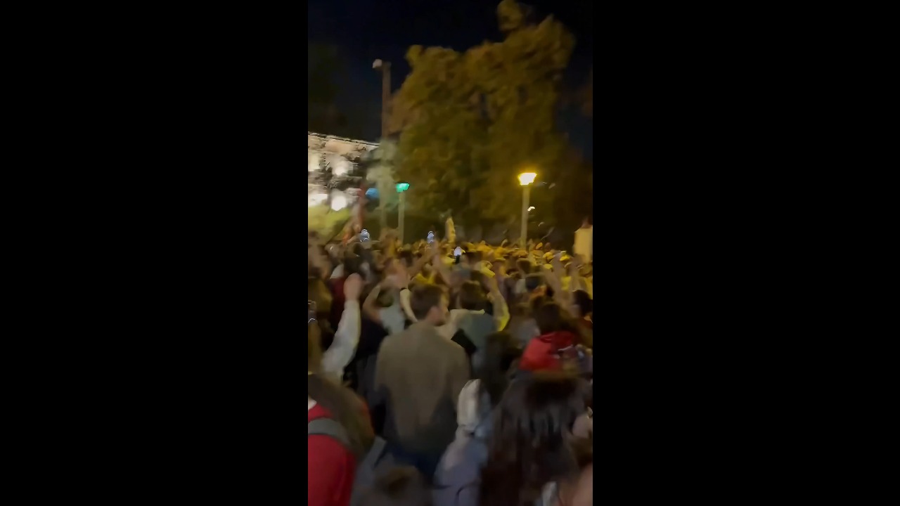 Students and supporters welcome marching demonstrators arriving in Belgrade, Serbia