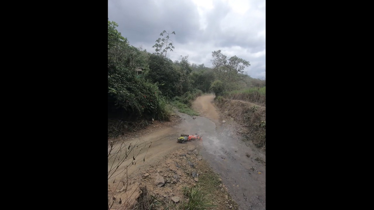 Enduro racer crashes near water stream aftea r veering off course in Balsas, Ecuador