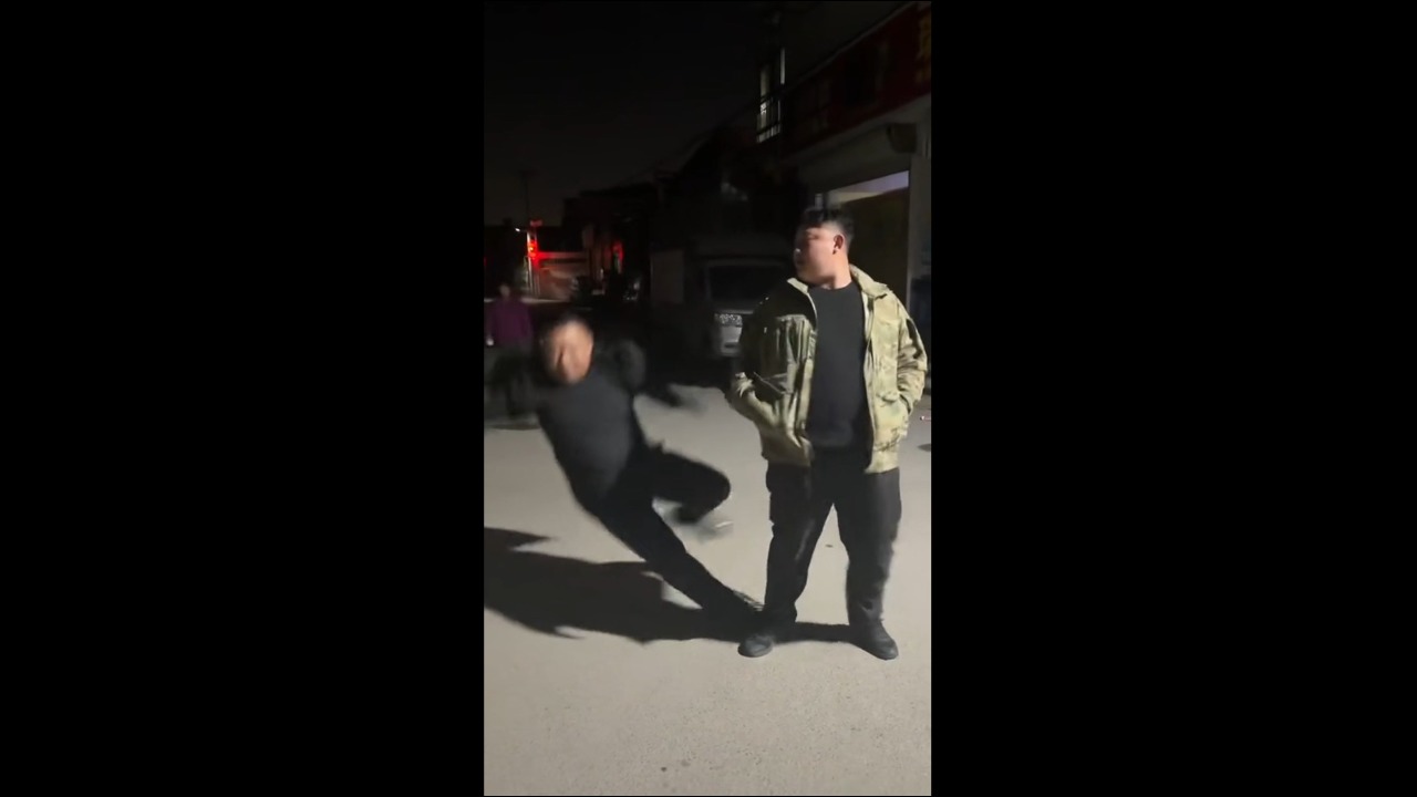 Man loses balance and rolls onto the ground while attempting a leg kick in Hebei, China