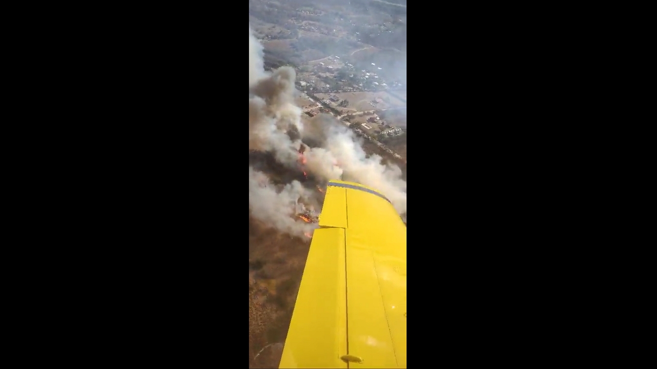 Aerial view: firefighter's perspective on wildfires in Córdoba, Argentina
