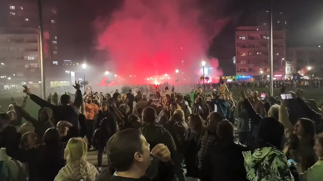 Crowds celebrate student-led movement with red flares in Kragujevac, Serbia