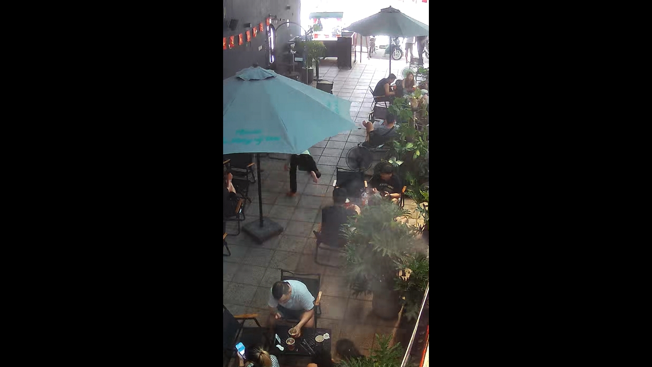 Man trips and loses slipper at café in Gia Tân, Vietnam