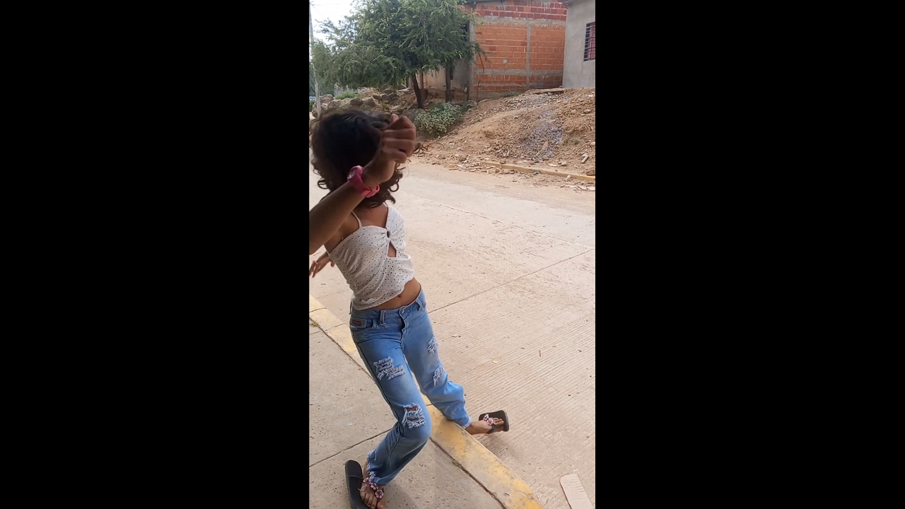 Girl afraid of firework explosion in Norosí, Colombia