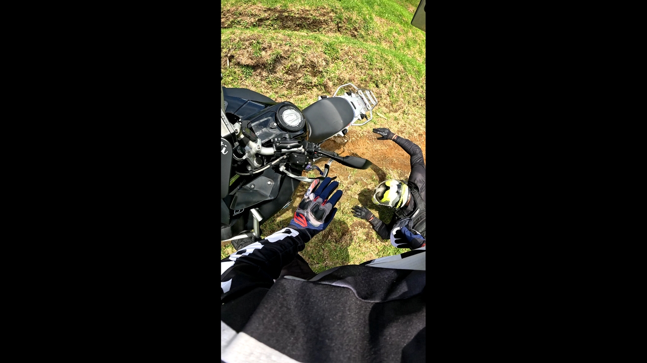 Motorbike mishap as friends slip while climbing in Medellín, Colombia