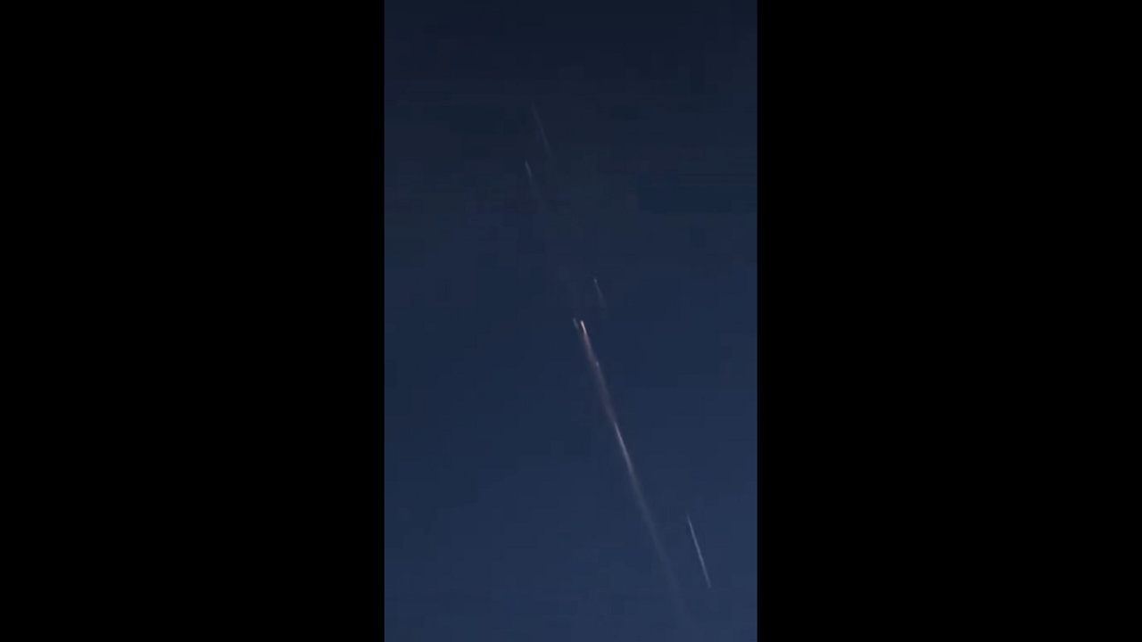 SpaceX satellite re-entry lights up the night sky in Dötlingen, Germany