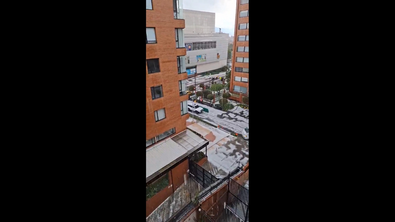 Heavy hailstorm blankets the city in a winter-like scene in Bogotá, Colombia