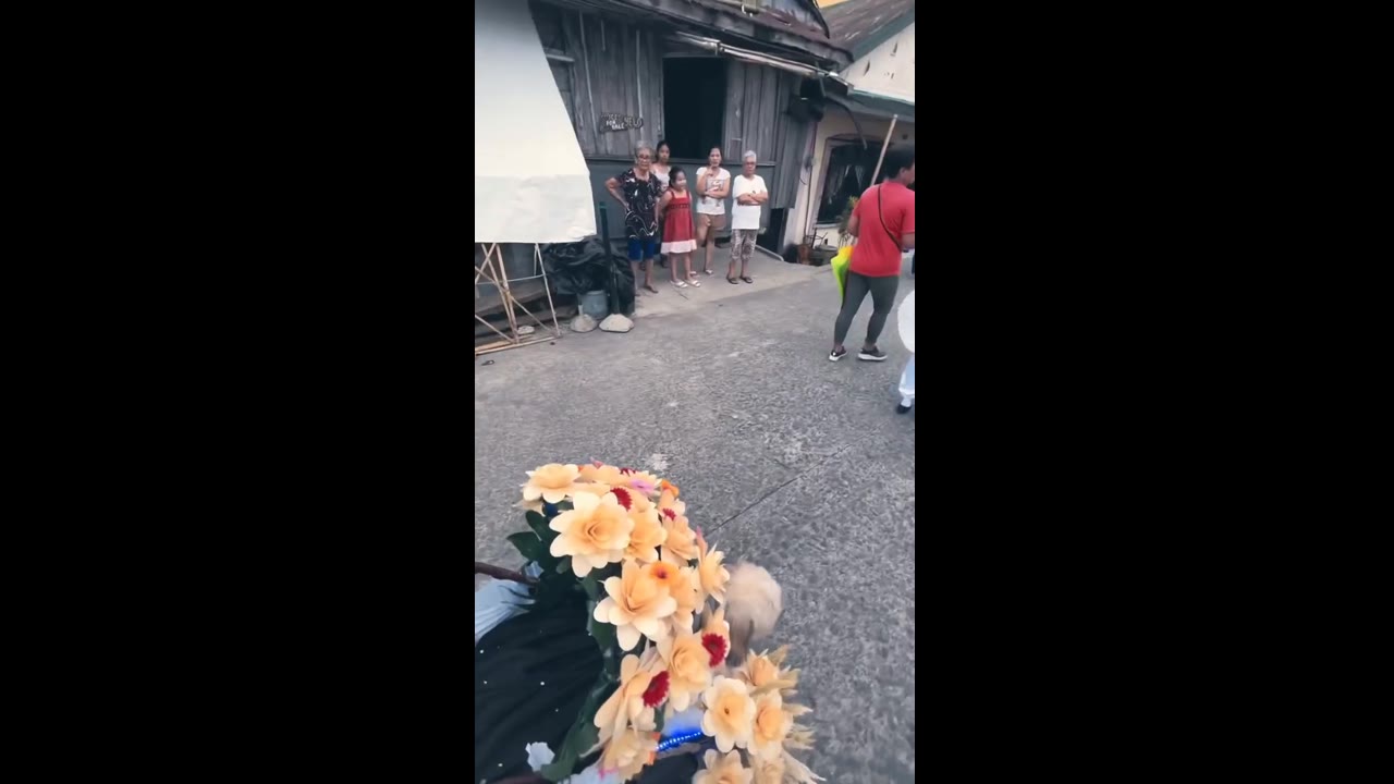 Floral finesse: man and dog make a majestic entrance at Sagala 2023 parade