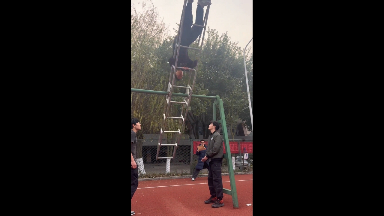 Student practices daily aviation training on 360° rotating swing in Sichuan, China