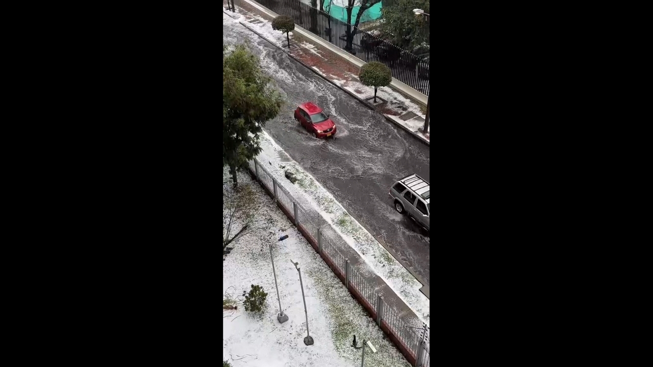Heavy hailstorm turns streets into icy waterways in Bogotá, Colombia