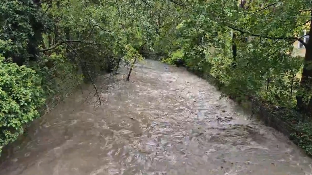 Mödlingbach brook nears overflow after heavy rain in Mödling, Austria