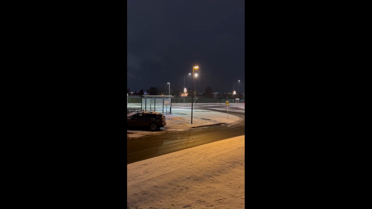 Neighborhood blanketed by heavy, swirling snowfall in Reykjavík, Iceland