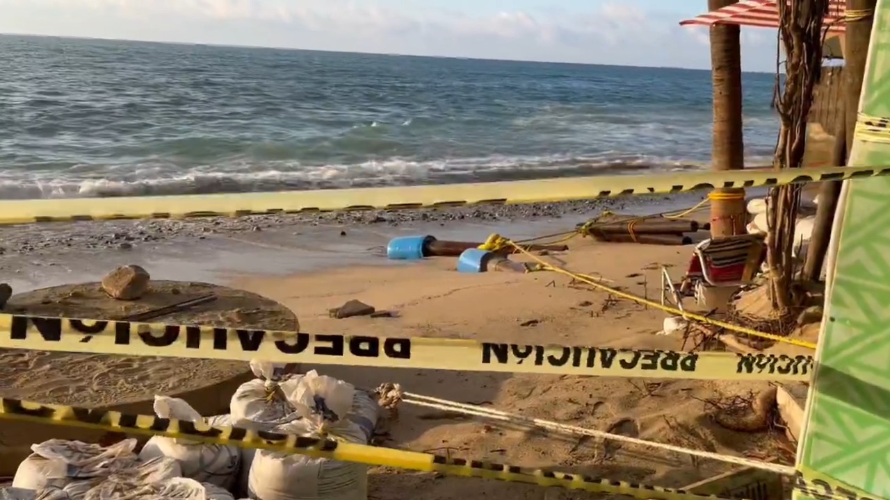 Part of the beachfront complex collapses into the ocean in San Pancho, Mexico