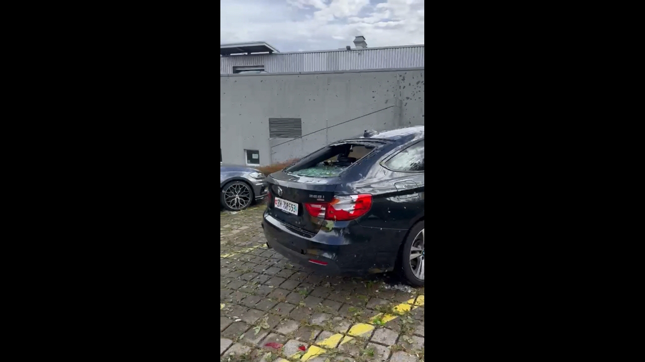 Massive hailstones shatter car windows during severe storm in Zürich, Switzerland