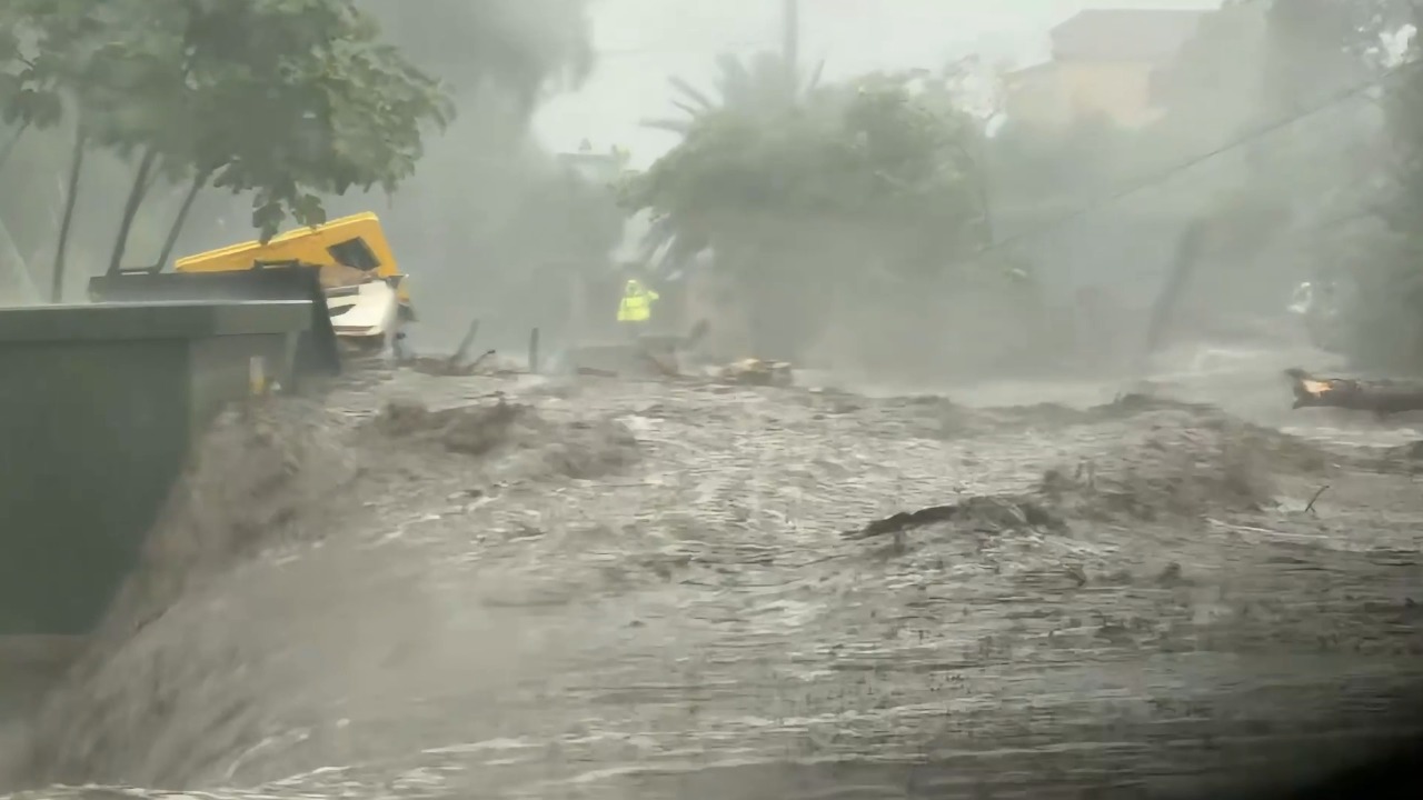 Torrential rain triggers severe flash flooding across a road in Ghisonaccia, France