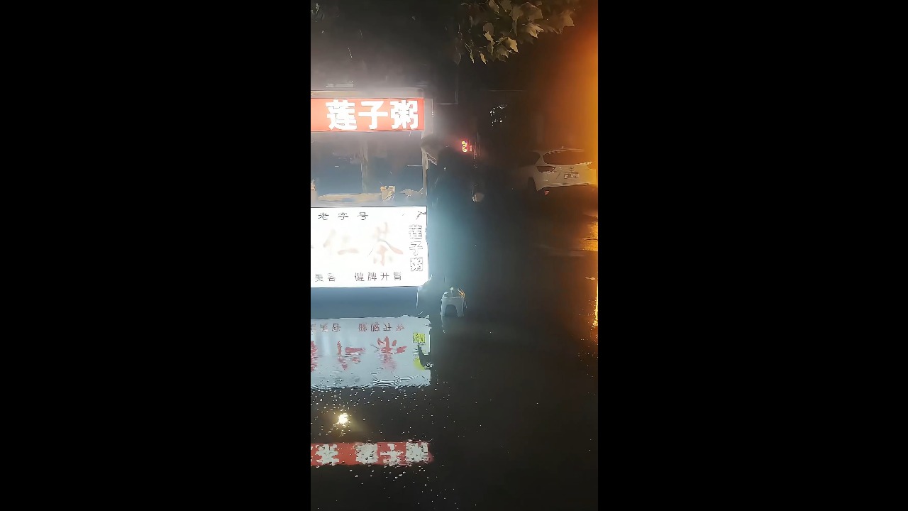 Man slips and falls while balancing on two plastic stools in Yuncheng, China