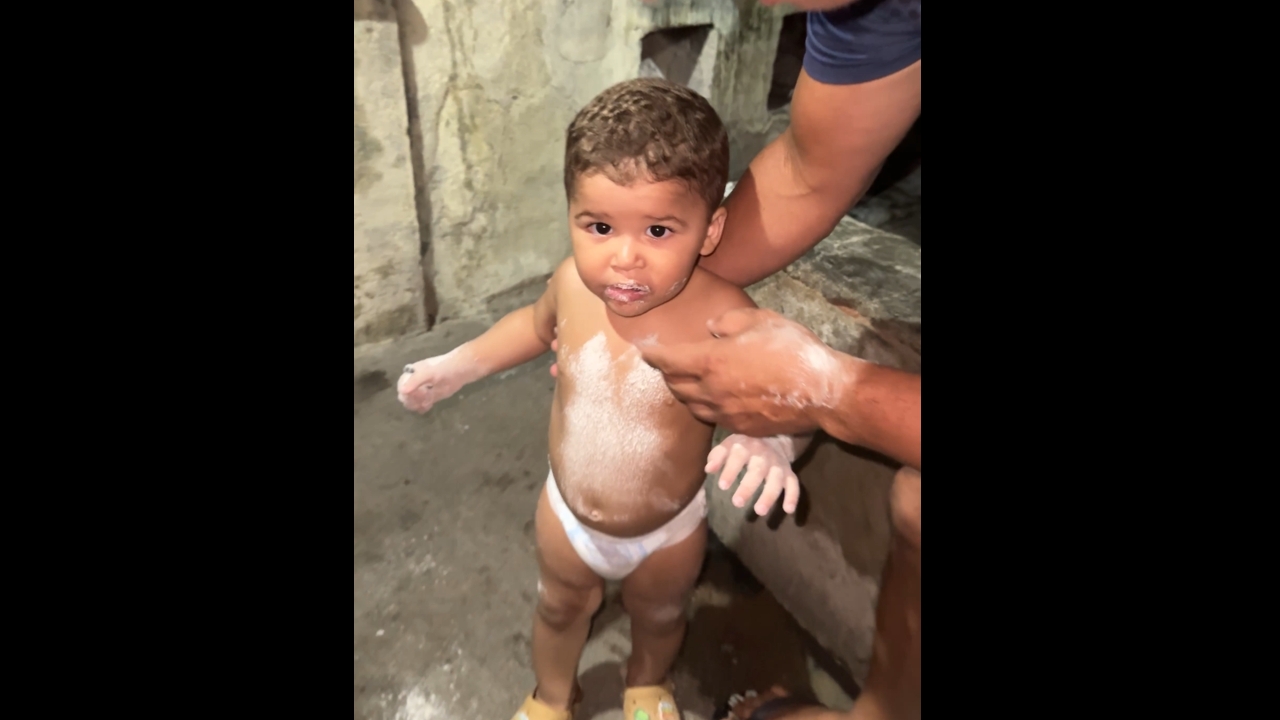 Toddler eats coal ash in Choró, Ceará, Brazil
