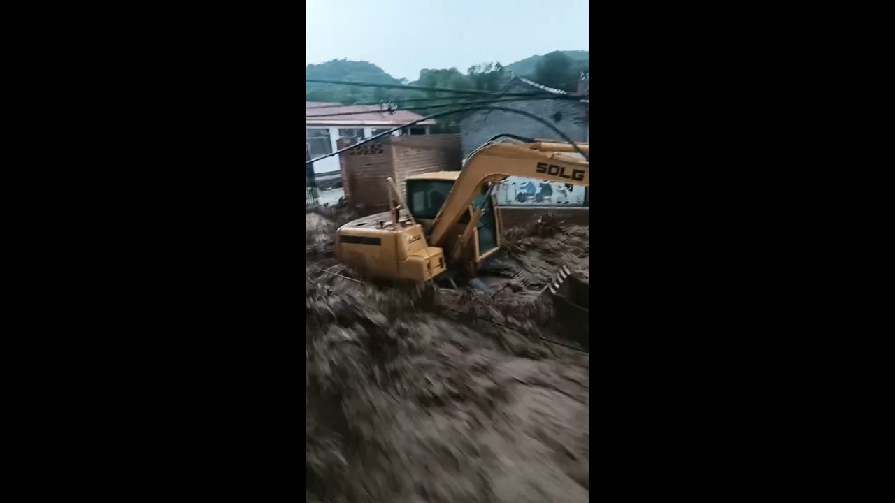 Flash flood and mudflow sweep through village in Lüliang, Shanxi, China