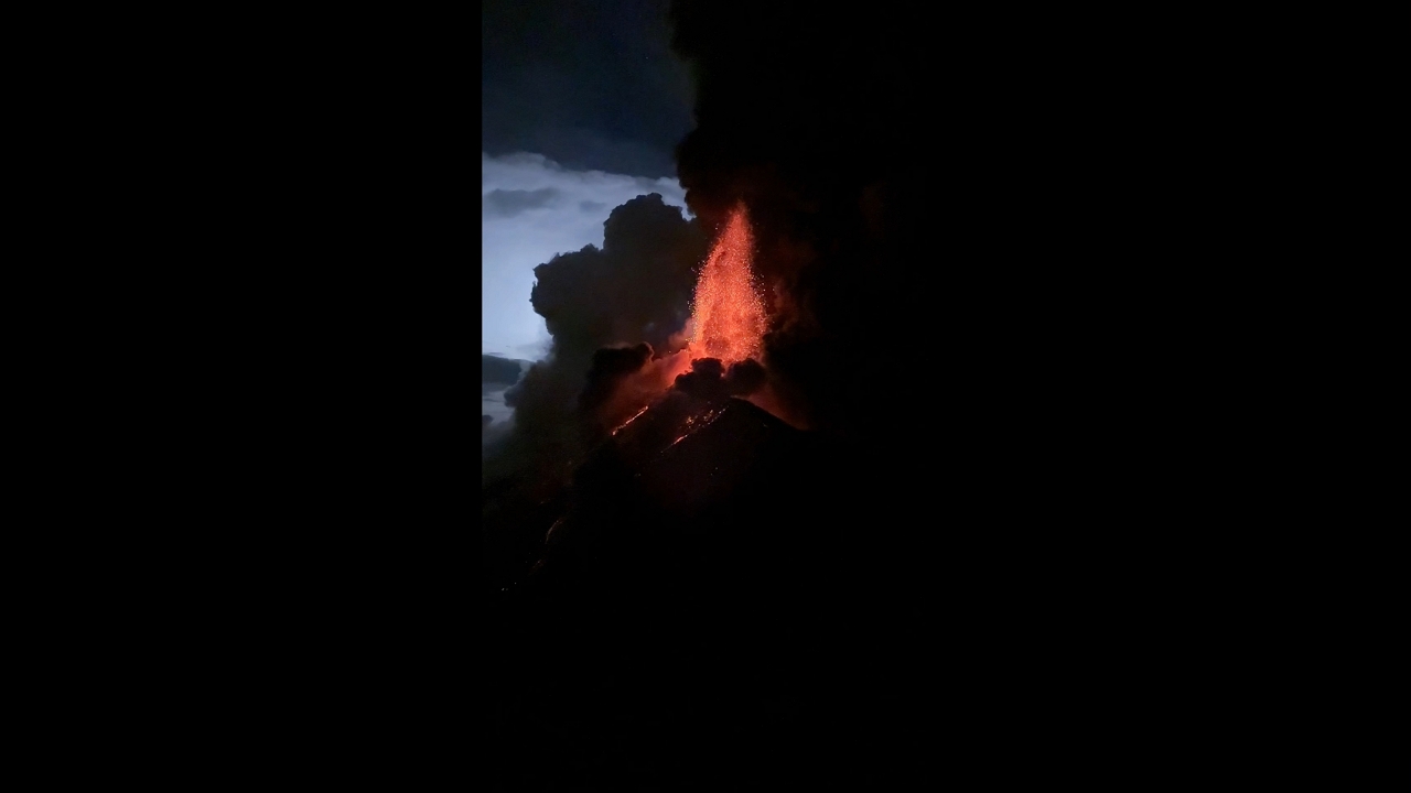 Volcán de Fuego erupts with towering lava fountains over Antigua, Guatemala