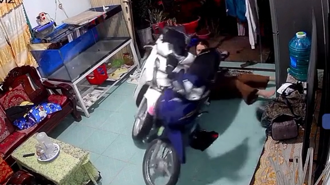 Motorcycle slip inside house in Bình Minh, Vietnam