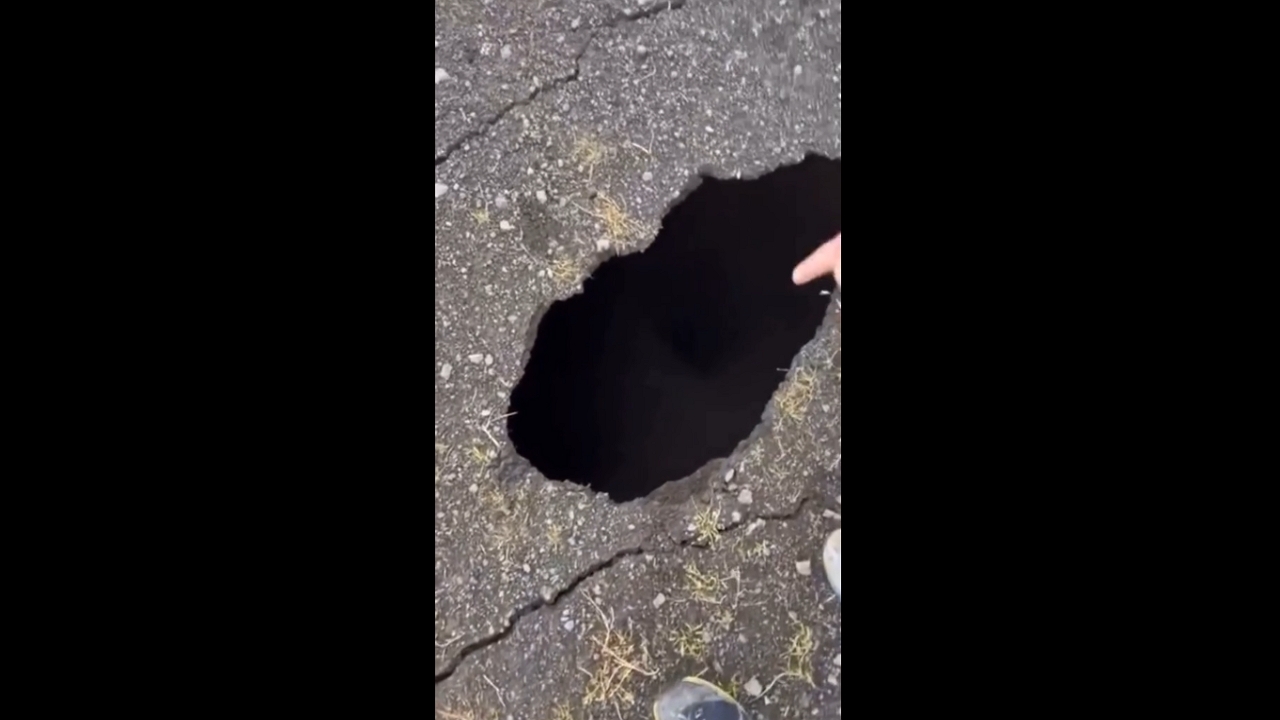 Grindavík's quake unleashes havoc with massive hole on the road