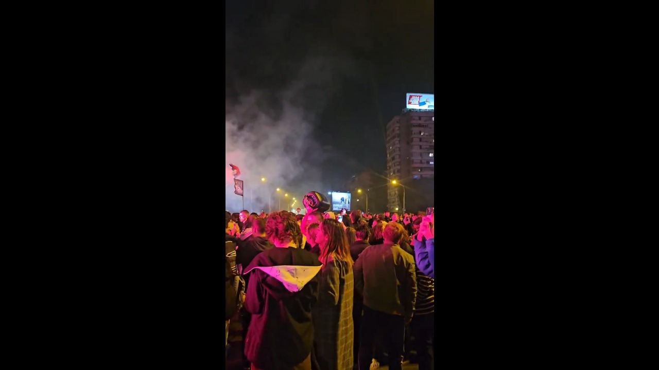 Crowds cheer and play music during election victory celebrations in New Belgrade, Serbia