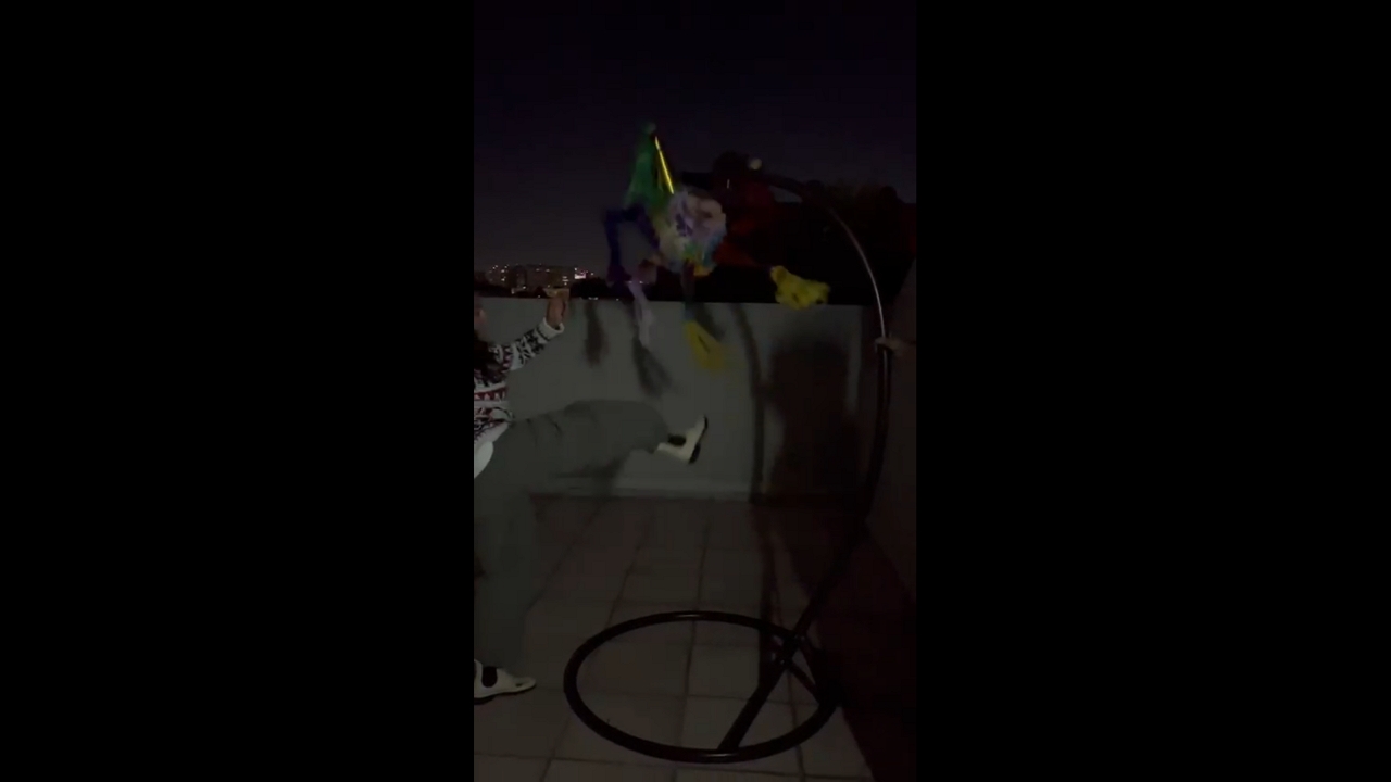 Piñata flies off rooftop after failed kick in Mexico City, Mexico