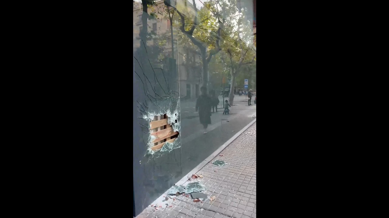 MediaMarkt storefront left smashed and vandalized after unrest in Barcelona, Spain