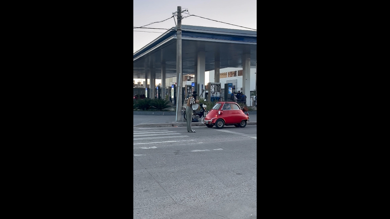 Vintage mini car spotted crossing avenue in Bahía Blanca, Argentina