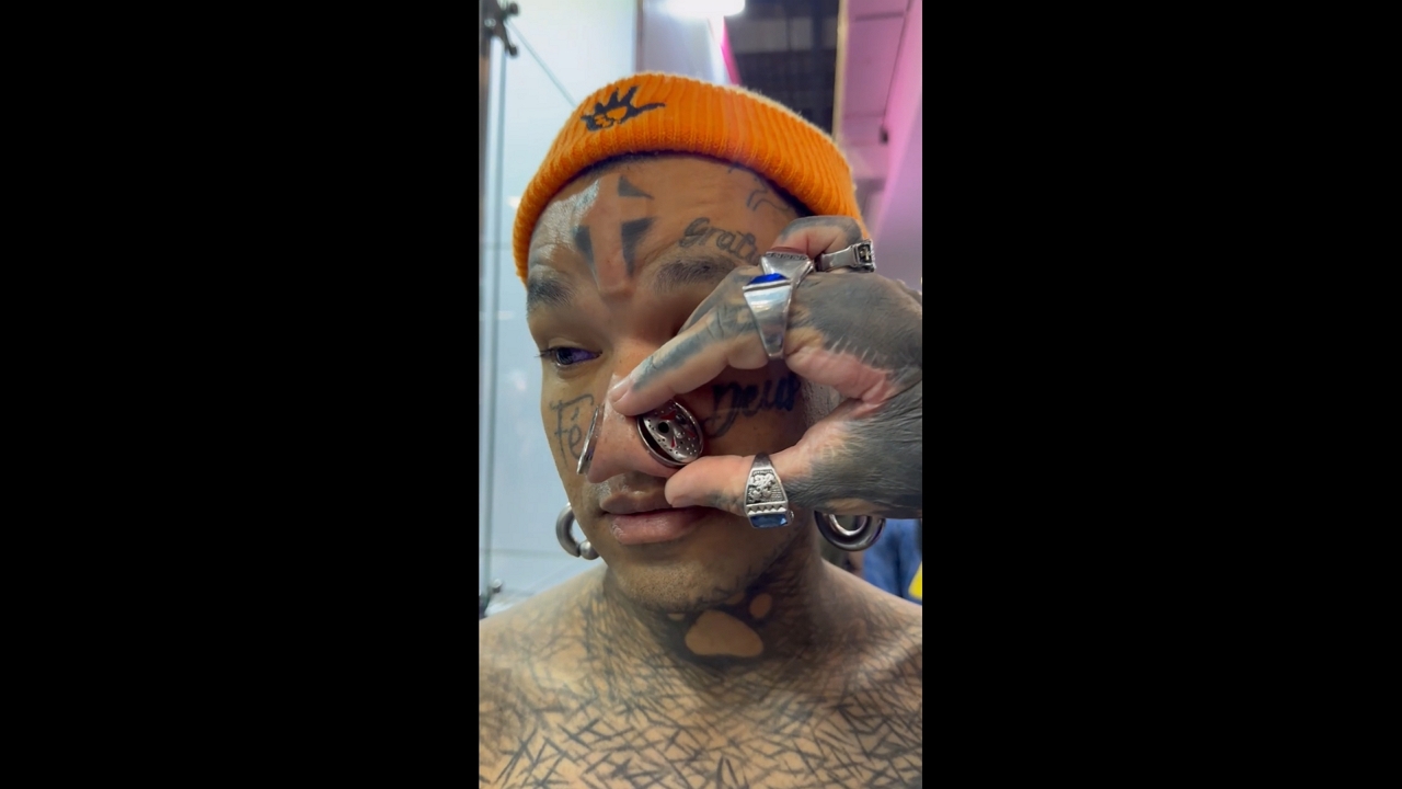 Heavily tattooed men showcase extreme body modifications in São Paulo, Brazil