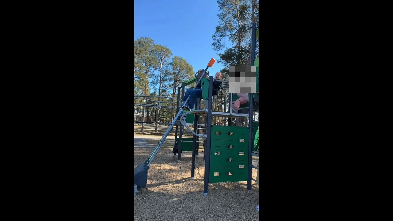 Woman loses balance on playground ride in Östersund, Sweden