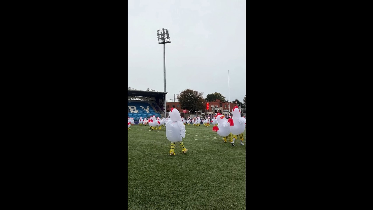 Dozens of people run around in inflatable chicken costumes in Dublin, Ireland