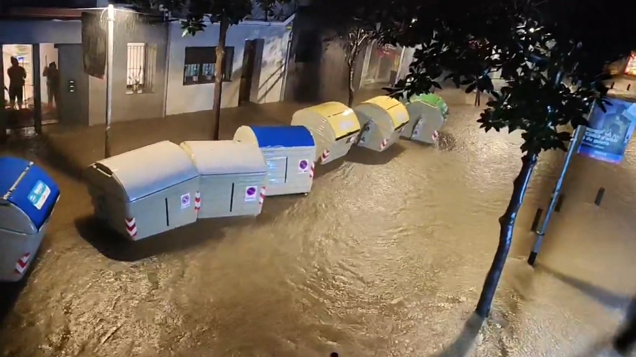 Torrential floodwaters sweep through streets in Cornellà de Llobregat, Spain