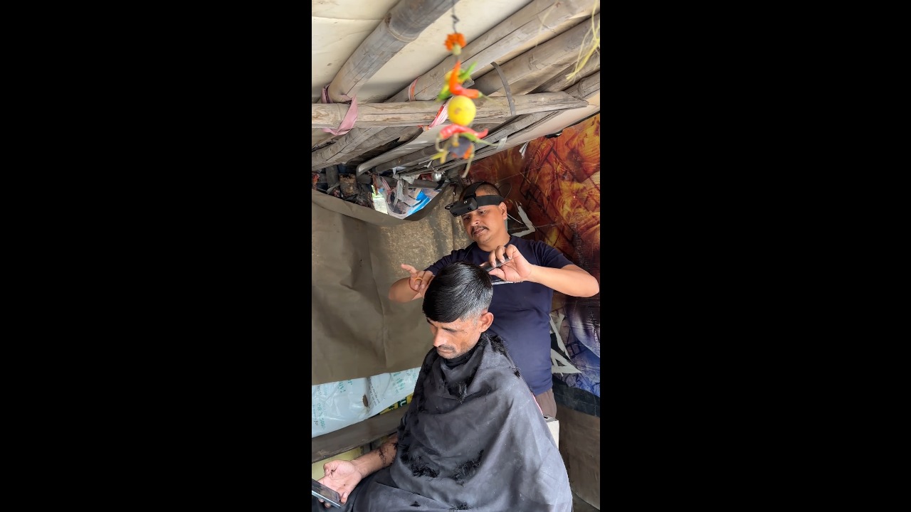 Indian workers wear head-mounted cameras to collect data for AI training in Delhi, India