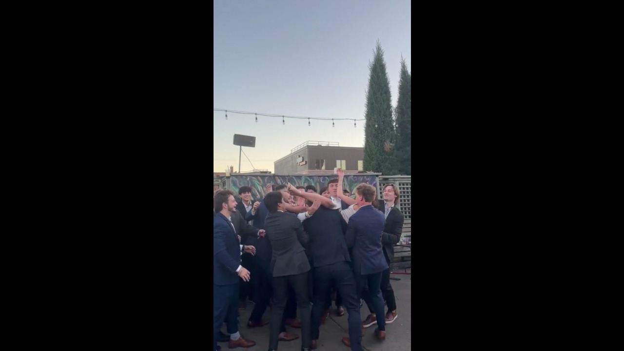 Woman's celebratory toss ends with an awkward fall in Lincoln, USA