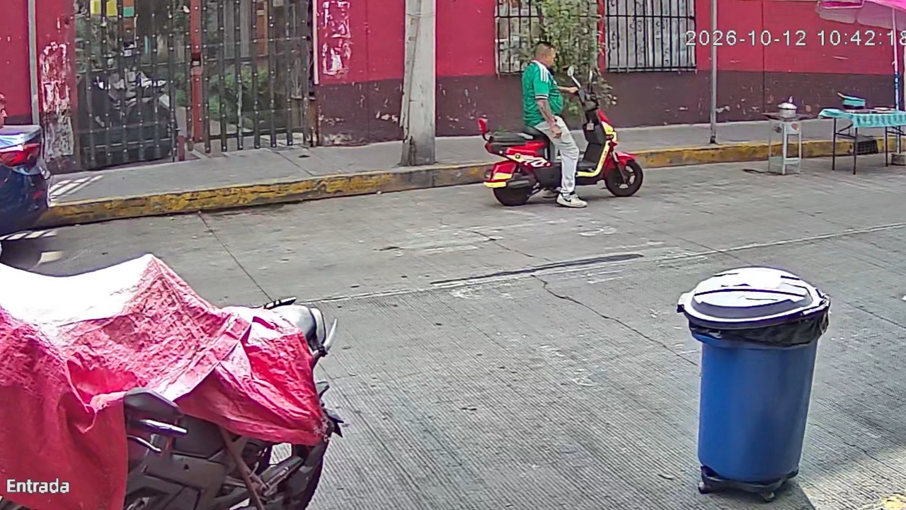 Van hits hand truck carrying wooden planks, sending man into roadside food stall in Mexico
