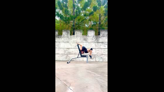 Achieving a full-power back bend on the workout bench