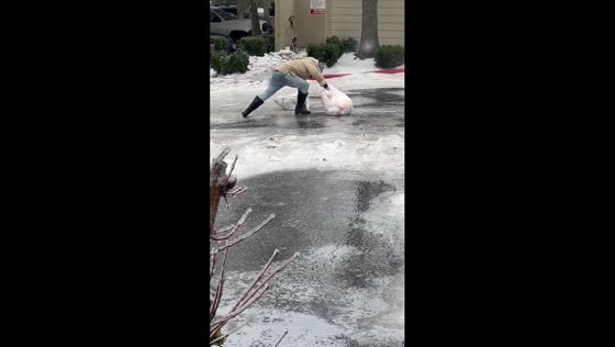 Icy hilarity in Portland: neighbor's slippery struggle caught on camera