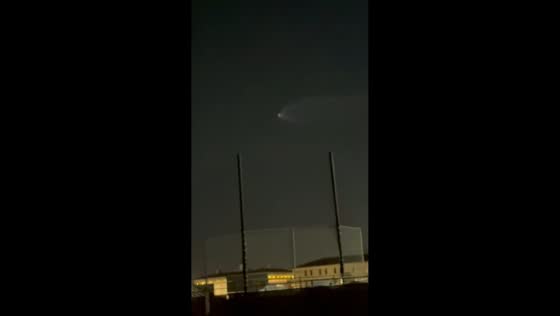 Rocket streaks across night sky after launch in Fullerton, California, USA