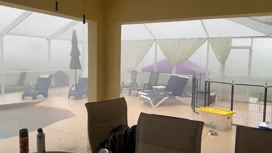 Summer rain shower passes through in Morrison, Florida, USA