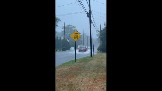 Flooded streets after heavy downpour in East Islip, New York