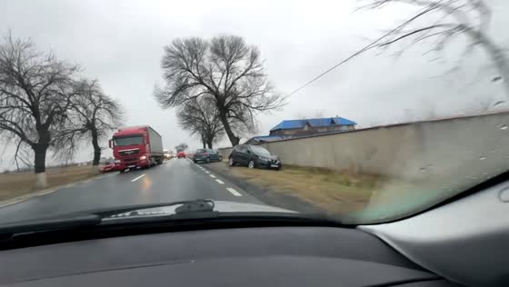 Driver collides with car while distracted by crash in Ștefănești, Romania
