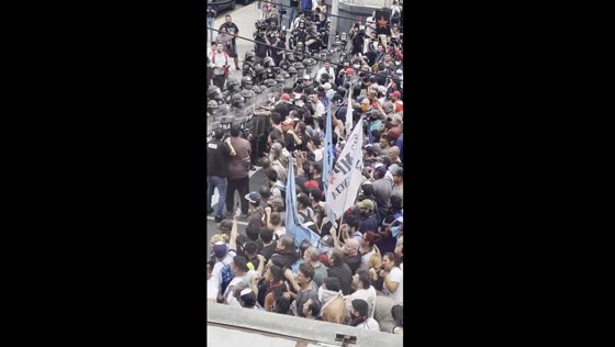 Anti-government protest meets police line in Avellaneda, Argentina