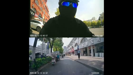 Rider gets tangled in rope on street in Anhui, China