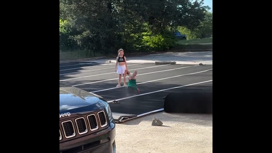 Child surprises gym-goers with impressive backflip