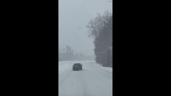 Intense winter snowstorm impacts airport and highways in Charlotte, North Carolina, USA